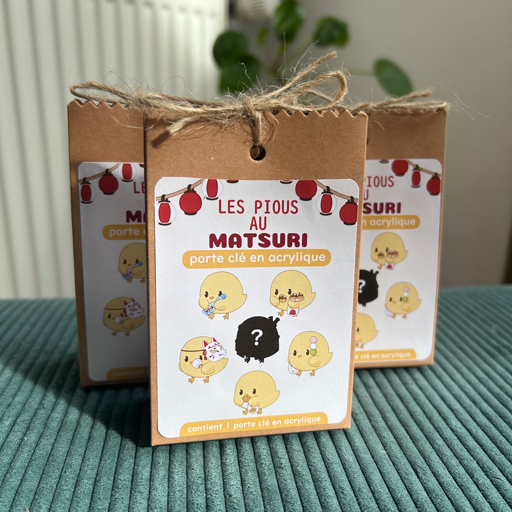 Porte-clés Pochette Mystère - Les Pious au Matsuri